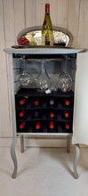 Load image into Gallery viewer, Larkin Sheet Music Wine Cabinet frontal view open door with props
