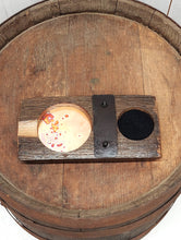 Load image into Gallery viewer, Top view of this genuine whiskey barrel stave, accented with a rustic barrel ring with a felt bottomed Glencairn Glass indent, and a copper bottomed cigar receptacle, measures 8” L x 4” W.